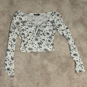 size xs floral cropped long sleeve with ruched detail on chest